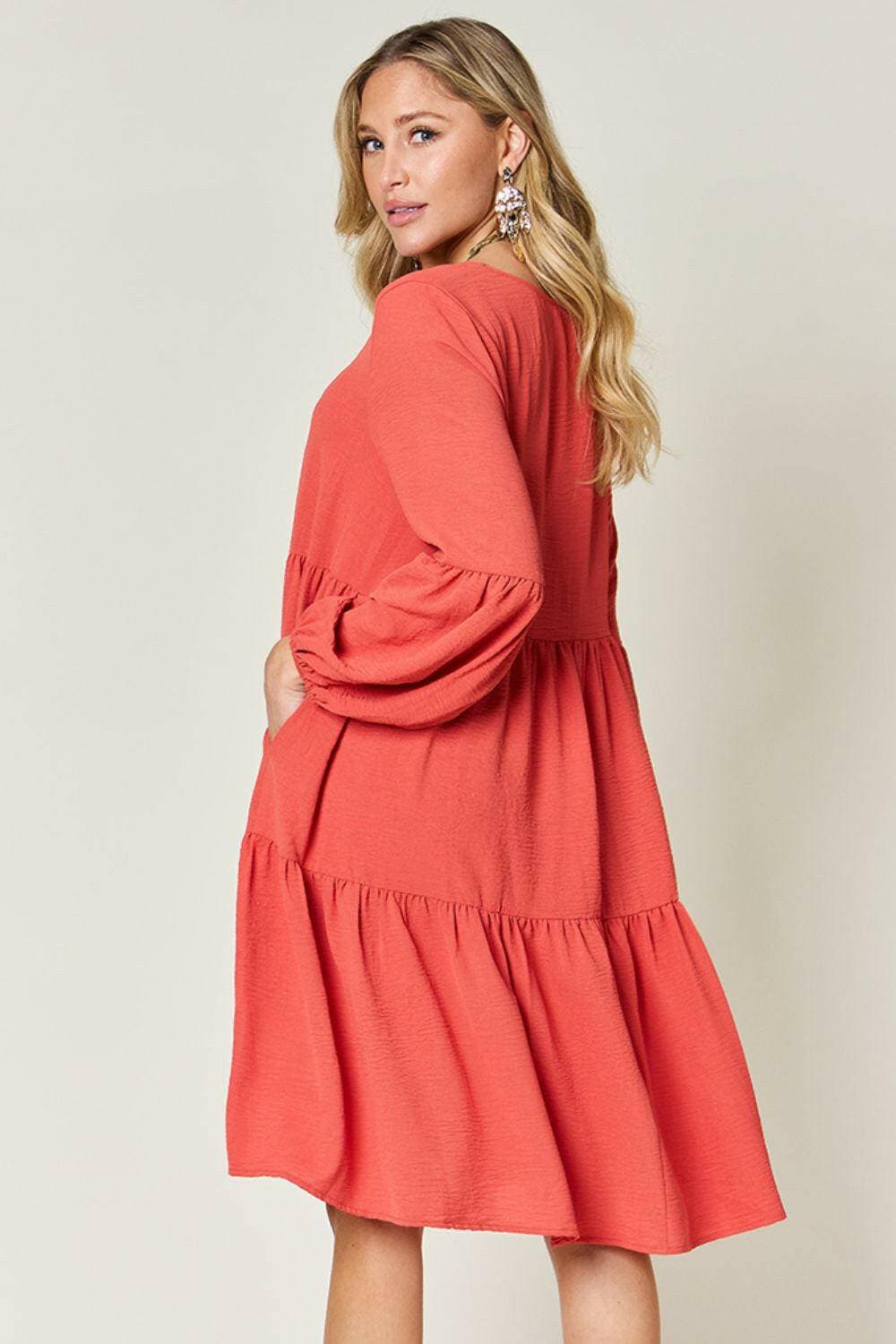 Double Vision V-Neck Balloon Sleeve Tiered DressDouble Vision V-Neck Balloon Sleeve Tiered Dress
 Step into the spotlight with our Double Vision V-Neck Balloon Sleeve Tiered Dress, a masterpiece designed to turn hLove Salve -Neck Balloon Sleeve Tiered DressColor