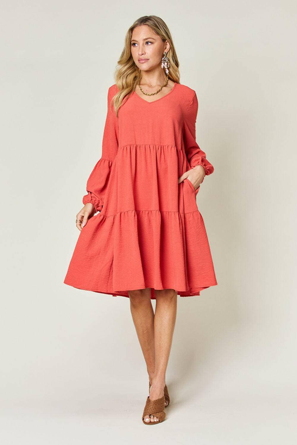 Double Vision V-Neck Balloon Sleeve Tiered DressDouble Vision V-Neck Balloon Sleeve Tiered Dress
 Step into the spotlight with our Double Vision V-Neck Balloon Sleeve Tiered Dress, a masterpiece designed to turn hLove Salve -Neck Balloon Sleeve Tiered DressColor