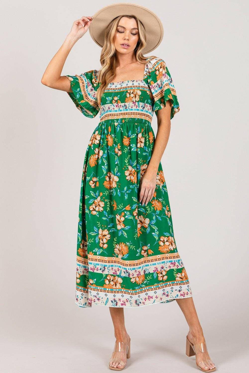 Sage and Fig Floral Print Midi Dress with Smocked SleevesElevate Your Wardrobe with the Sage and Fig Floral Print Midi Dress
 Step into a world of elegance and comfort with our Sage and Fig Floral Print Midi Dress. This muLove Salve Fig Floral Print Midi DressColor