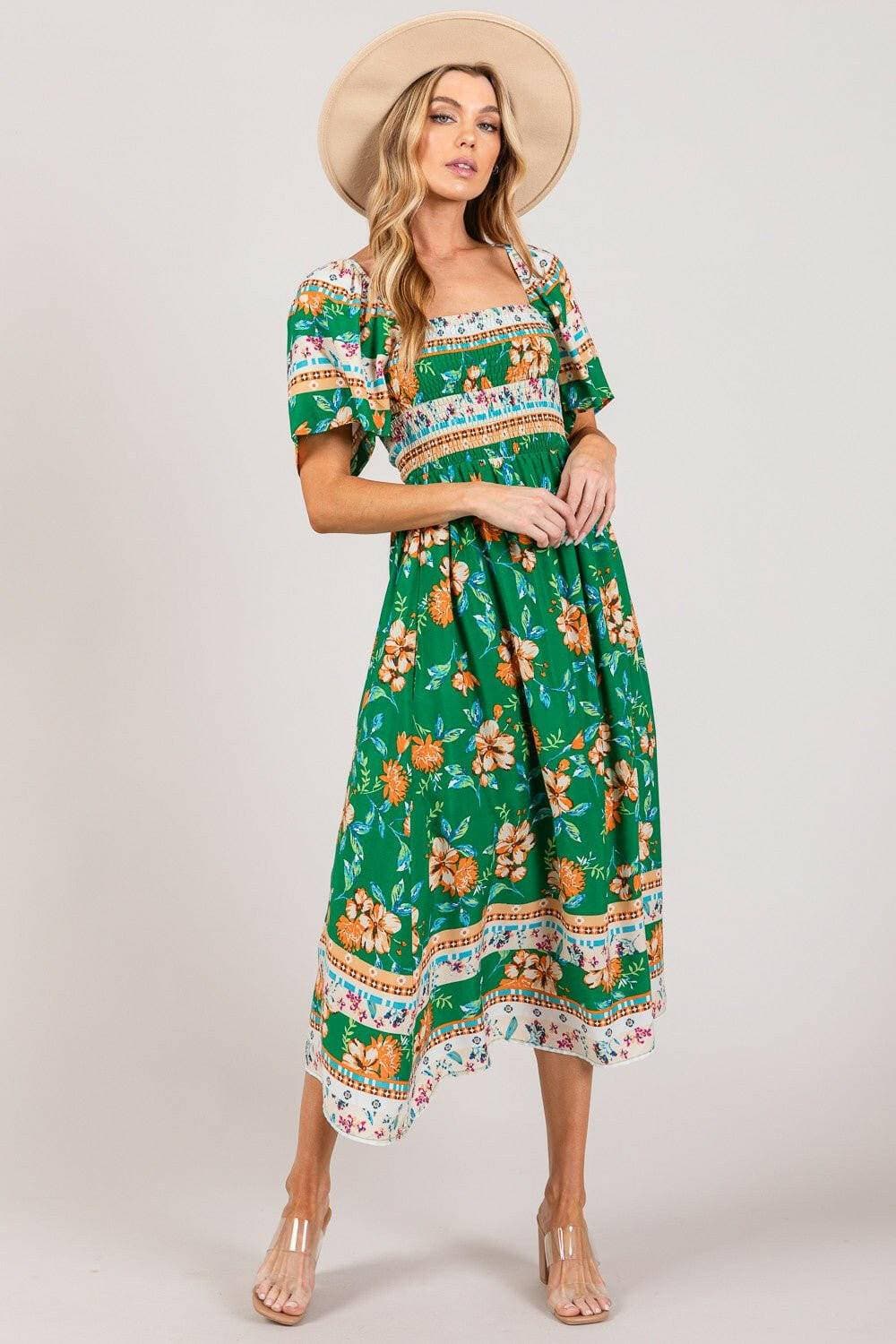 Sage and Fig Floral Print Midi Dress with Smocked SleevesElevate Your Wardrobe with the Sage and Fig Floral Print Midi Dress
 Step into a world of elegance and comfort with our Sage and Fig Floral Print Midi Dress. This muLove Salve Fig Floral Print Midi DressColor