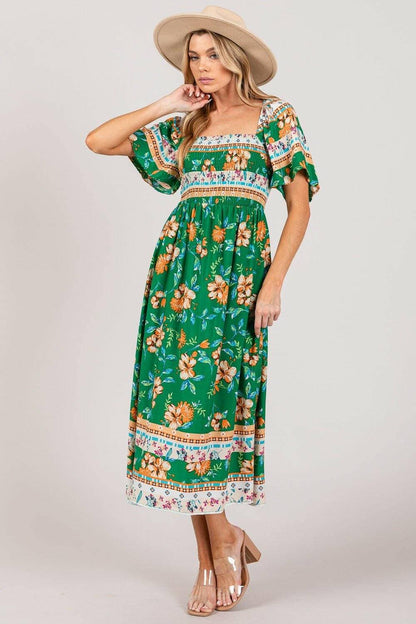 Sage and Fig Floral Print Midi Dress with Smocked SleevesElevate Your Wardrobe with the Sage and Fig Floral Print Midi Dress
 Step into a world of elegance and comfort with our Sage and Fig Floral Print Midi Dress. This muLove Salve Fig Floral Print Midi DressColor