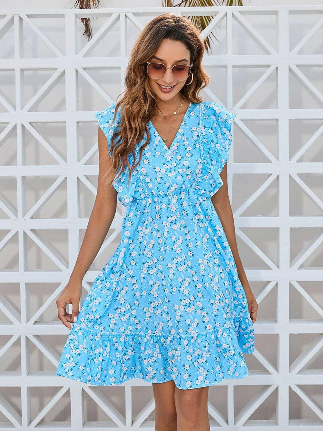 Enchanting Floral Ruffle Wrap Mini DressEnchanting Floral Ruffle Wrap Mini Dress
 Indulge in the allure of the Enchanting Floral Ruffle Wrap Mini Dress, a chic ensemble that seamlessly combines elegance anLove Salve Enchanting Floral Ruffle Wrap Mini DressColor