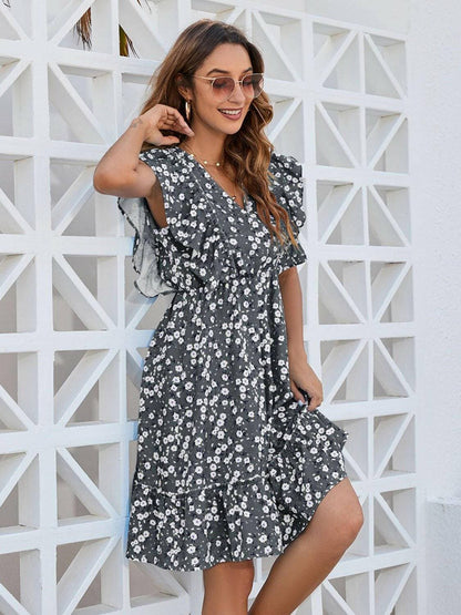 Enchanting Floral Ruffle Wrap Mini DressEnchanting Floral Ruffle Wrap Mini Dress
 Indulge in the allure of the Enchanting Floral Ruffle Wrap Mini Dress, a chic ensemble that seamlessly combines elegance anLove Salve Enchanting Floral Ruffle Wrap Mini DressColor