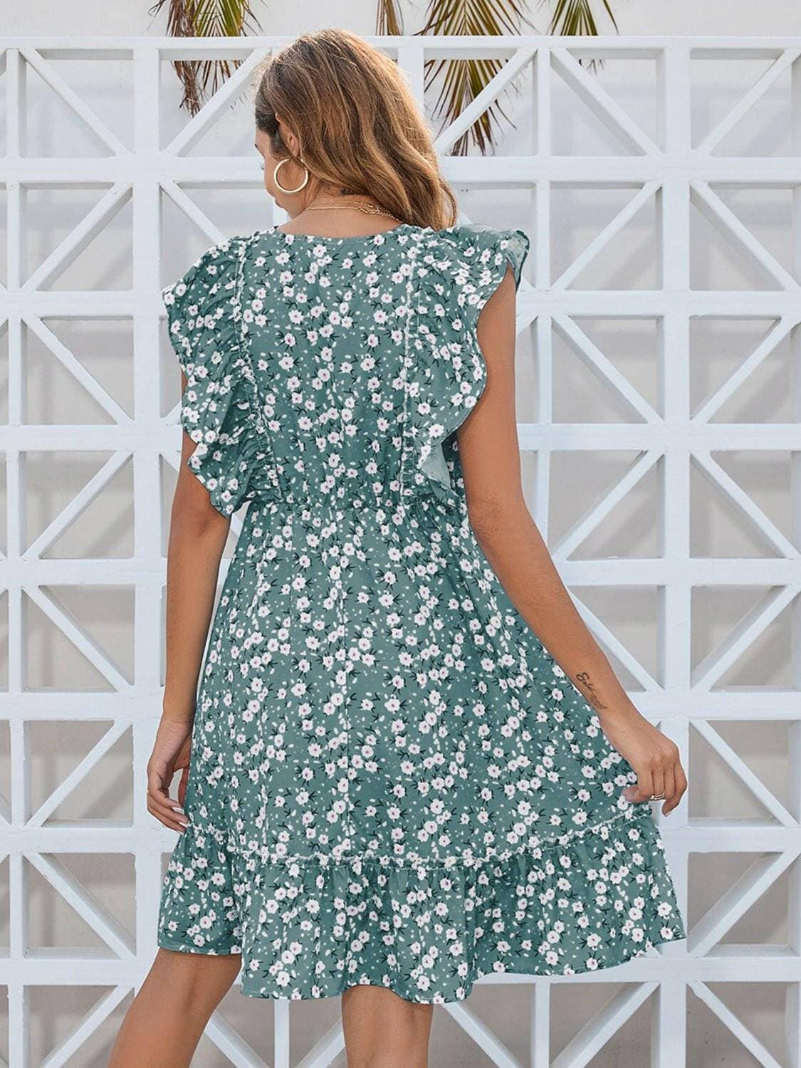 Enchanting Floral Ruffle Wrap Mini DressEnchanting Floral Ruffle Wrap Mini Dress
 Indulge in the allure of the Enchanting Floral Ruffle Wrap Mini Dress, a chic ensemble that seamlessly combines elegance anLove Salve Enchanting Floral Ruffle Wrap Mini DressColor