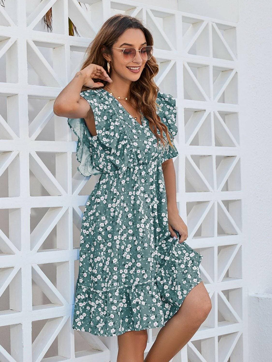 Enchanting Floral Ruffle Wrap Mini DressEnchanting Floral Ruffle Wrap Mini Dress
 Indulge in the allure of the Enchanting Floral Ruffle Wrap Mini Dress, a chic ensemble that seamlessly combines elegance anLove Salve Enchanting Floral Ruffle Wrap Mini DressColor