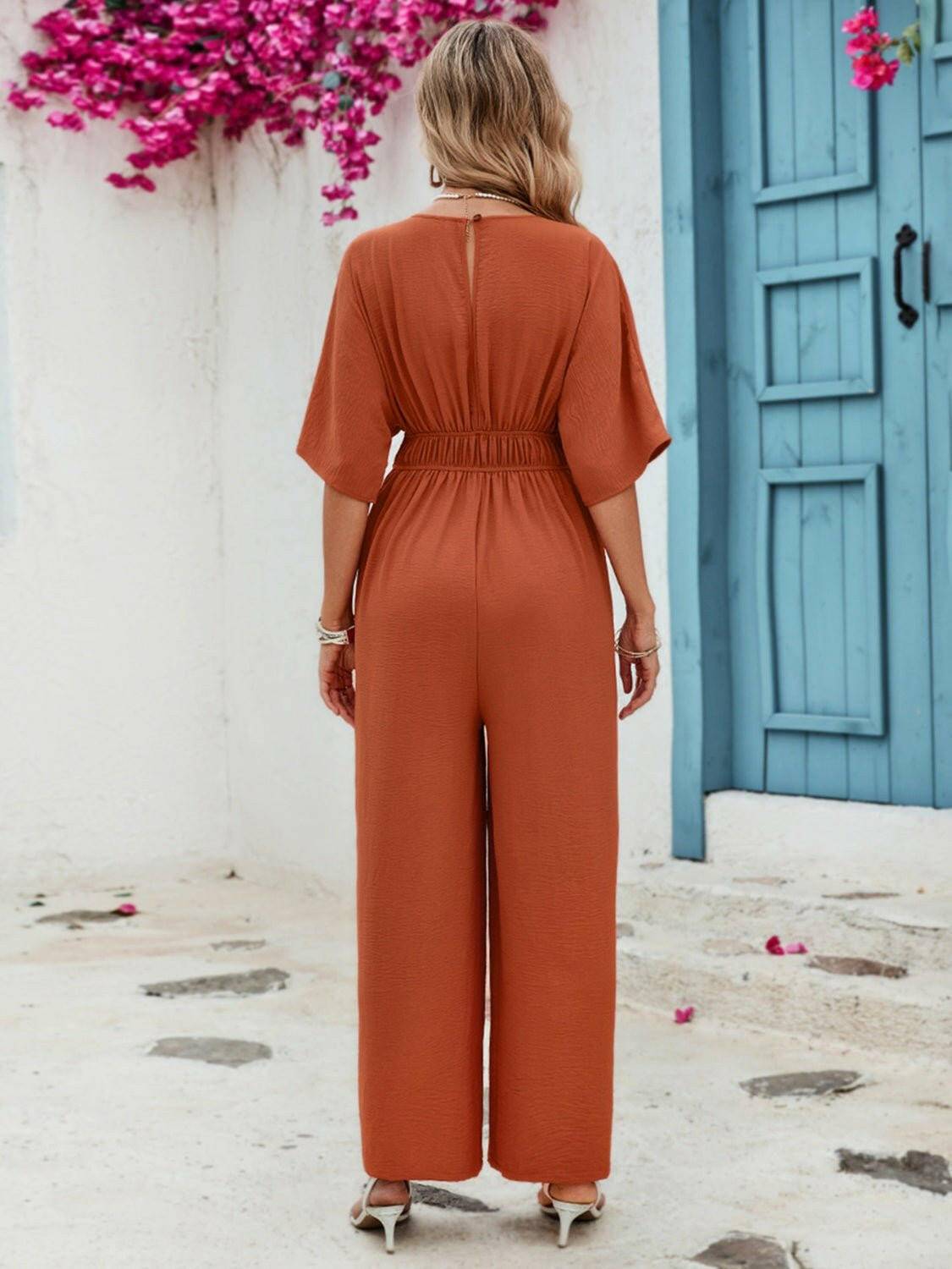 Elegant Button Detail V-Neck Jumpsuit with Half SleevesElegant Button Detail V-Neck Jumpsuit with Half Sleeves
 Upgrade your style effortlessly with our sophisticated jumpsuit, designed to elevate your look for any occasLove Salve Elegant Button DetailColor