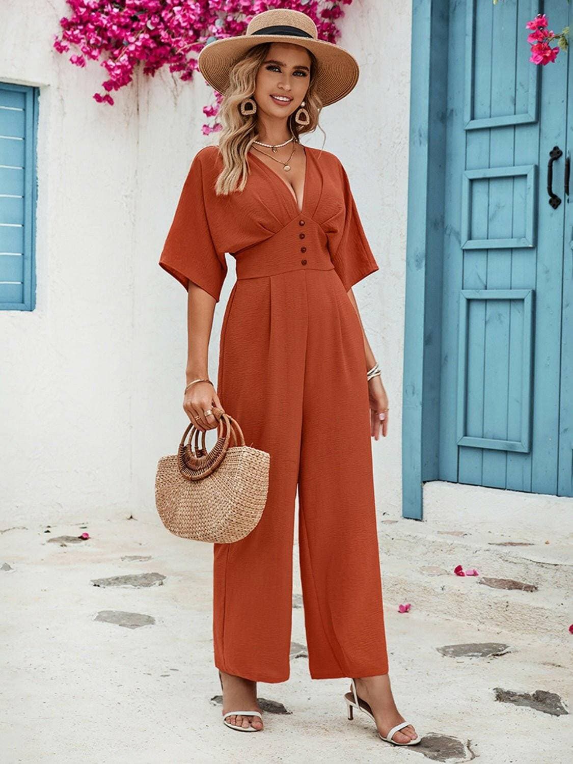 Elegant Button Detail V-Neck Jumpsuit with Half SleevesElegant Button Detail V-Neck Jumpsuit with Half Sleeves
 Upgrade your style effortlessly with our sophisticated jumpsuit, designed to elevate your look for any occasLove Salve Elegant Button DetailColor