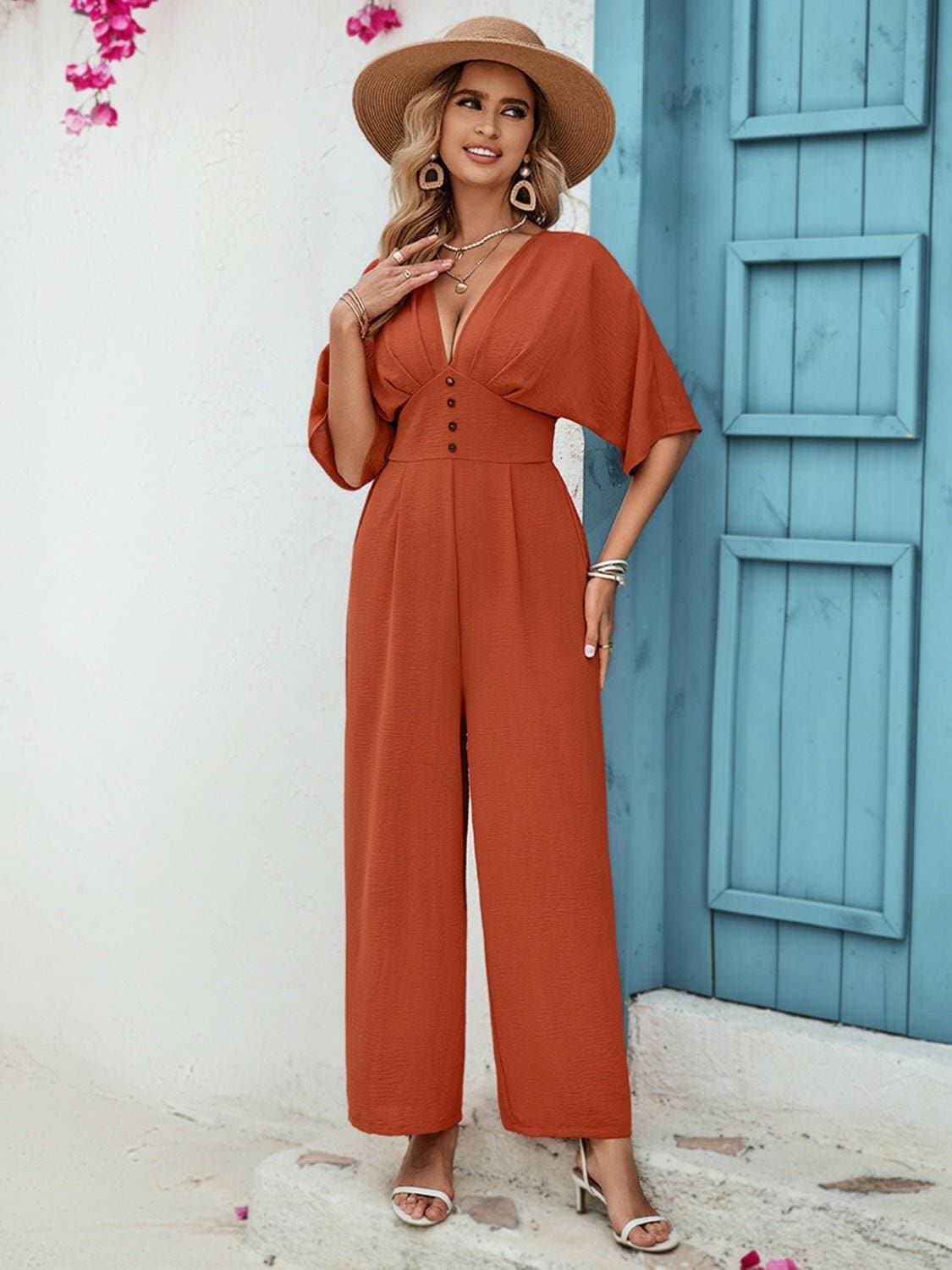 Elegant Button Detail V-Neck Jumpsuit with Half SleevesElegant Button Detail V-Neck Jumpsuit with Half Sleeves
 Upgrade your style effortlessly with our sophisticated jumpsuit, designed to elevate your look for any occasLove Salve Elegant Button DetailColor