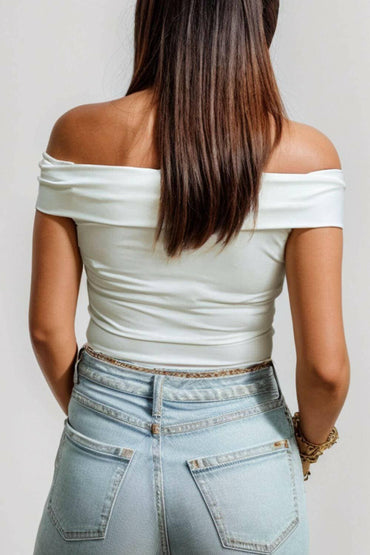 Chic Sheer Off-Shoulder Blouse with Short SleevesChic Sheer Off-Shoulder Blouse with Short Sleeves
 Upgrade your wardrobe with our Chic Sheer Off-Shoulder Blouse, designed to make you stand out at any event or gathLove Salve Chic SheerColor