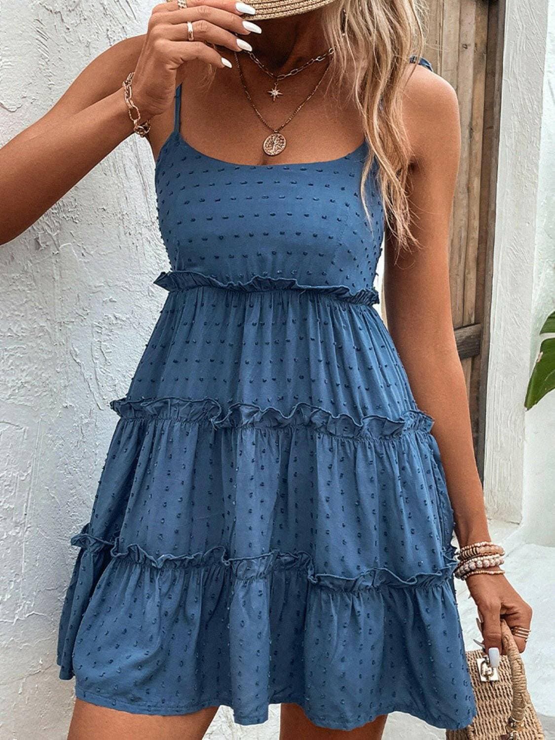 Elegant Tiered Spaghetti Strap Dress with Frill AccentsElegant Tiered Spaghetti Strap Dress with Frill Accents
 Step into sophistication with our Elegant Tiered Spaghetti Strap Dress, a blend of style and comfort that isLove Salve Elegant Tiered Spaghetti Strap DressColor