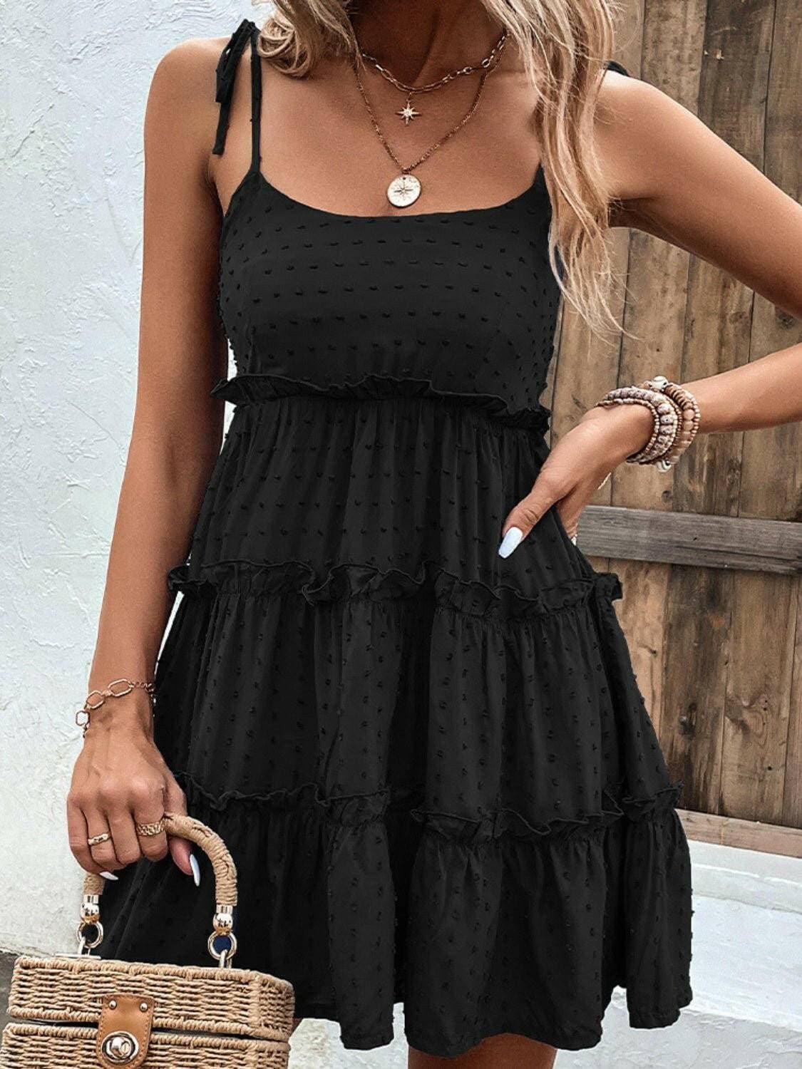 Elegant Tiered Spaghetti Strap Dress with Frill AccentsElegant Tiered Spaghetti Strap Dress with Frill Accents
 Step into sophistication with our Elegant Tiered Spaghetti Strap Dress, a blend of style and comfort that isLove Salve Elegant Tiered Spaghetti Strap DressColor