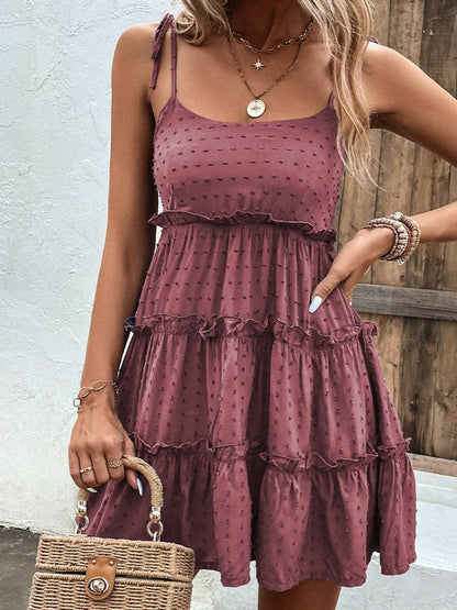 Elegant Tiered Spaghetti Strap Dress with Frill AccentsElegant Tiered Spaghetti Strap Dress with Frill Accents
 Step into sophistication with our Elegant Tiered Spaghetti Strap Dress, a blend of style and comfort that isLove Salve Elegant Tiered Spaghetti Strap DressColor