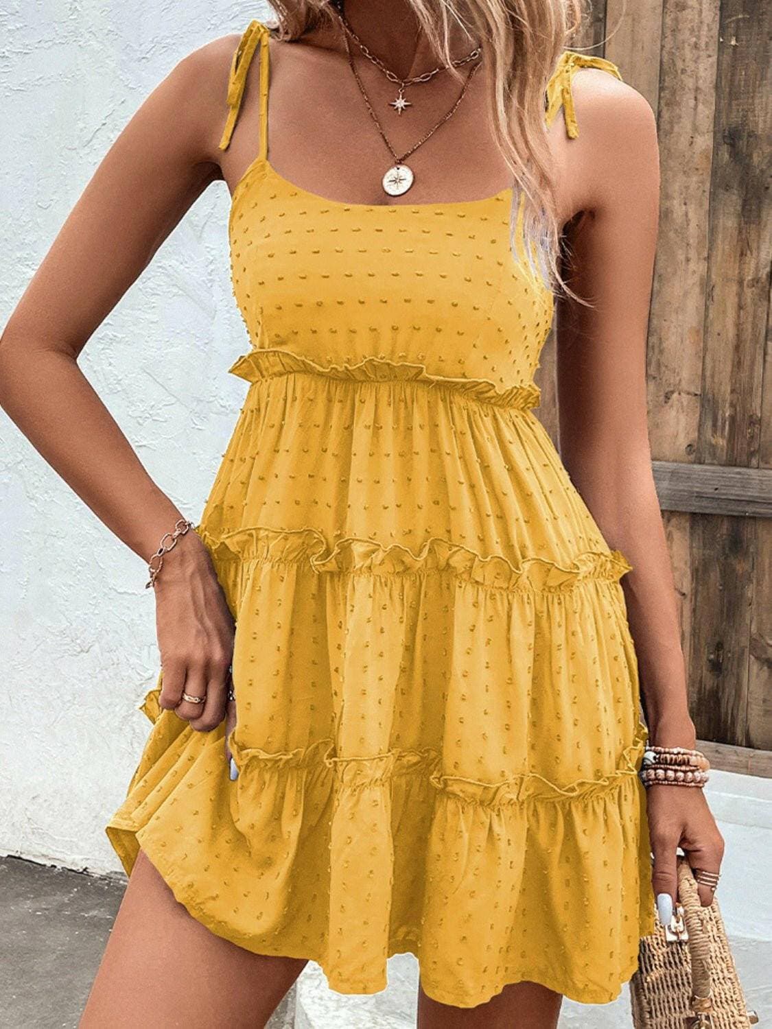 Elegant Tiered Spaghetti Strap Dress with Frill AccentsElegant Tiered Spaghetti Strap Dress with Frill Accents
 Step into sophistication with our Elegant Tiered Spaghetti Strap Dress, a blend of style and comfort that isLove Salve Elegant Tiered Spaghetti Strap DressColor