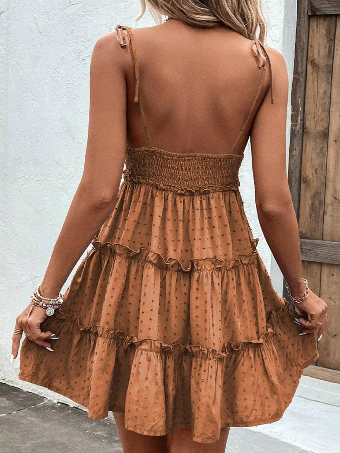 Elegant Tiered Spaghetti Strap Dress with Frill AccentsElegant Tiered Spaghetti Strap Dress with Frill Accents
 Step into sophistication with our Elegant Tiered Spaghetti Strap Dress, a blend of style and comfort that isLove Salve Elegant Tiered Spaghetti Strap DressColor