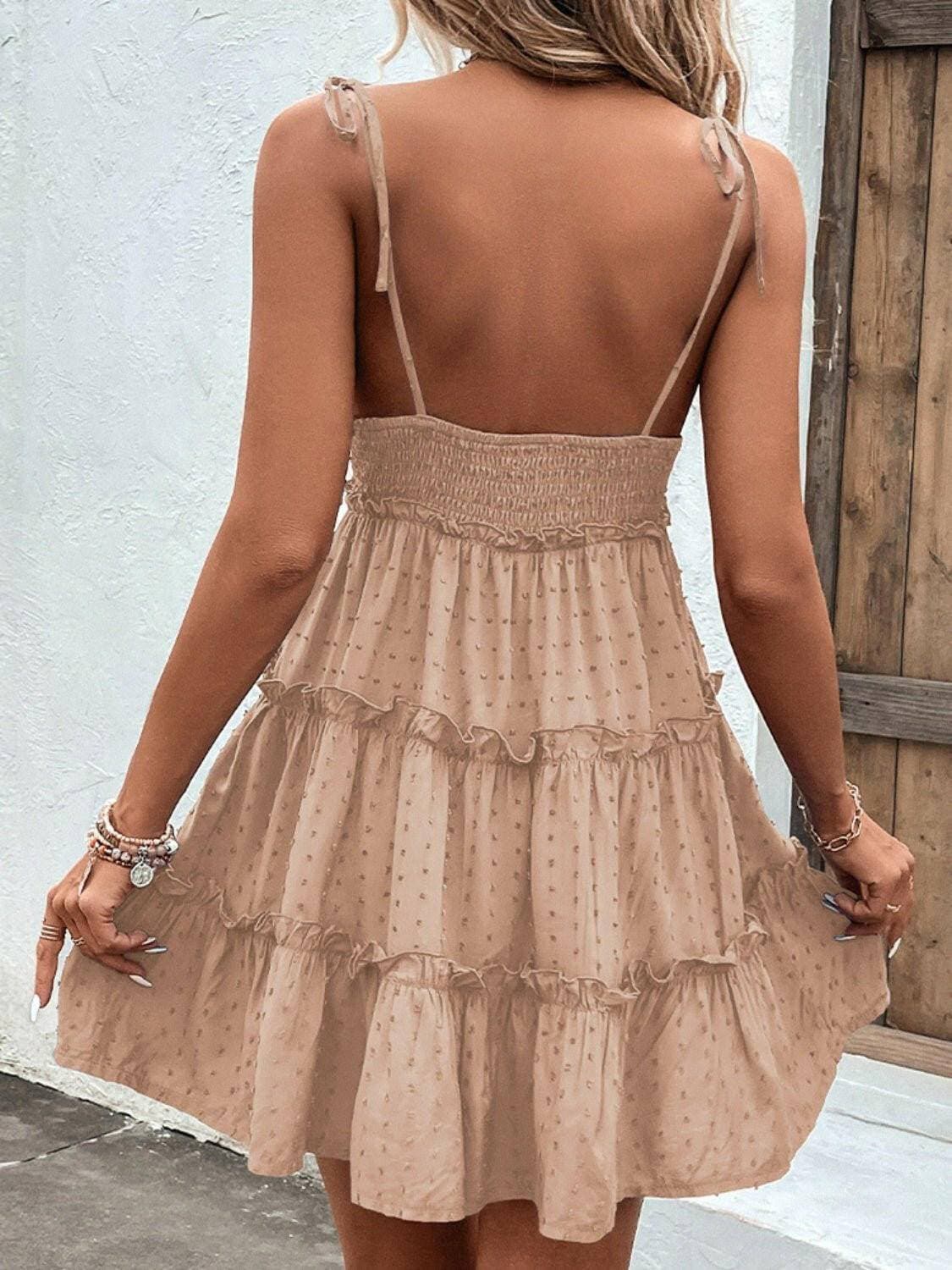 Elegant Tiered Spaghetti Strap Dress with Frill AccentsElegant Tiered Spaghetti Strap Dress with Frill Accents
 Step into sophistication with our Elegant Tiered Spaghetti Strap Dress, a blend of style and comfort that isLove Salve Elegant Tiered Spaghetti Strap DressColor