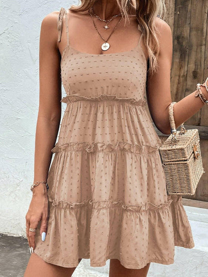 Elegant Tiered Spaghetti Strap Dress with Frill AccentsElegant Tiered Spaghetti Strap Dress with Frill Accents
 Step into sophistication with our Elegant Tiered Spaghetti Strap Dress, a blend of style and comfort that isLove Salve Elegant Tiered Spaghetti Strap DressColor