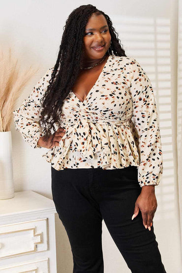 Vibrant plunge peplum top - tied detail - Love Salve 