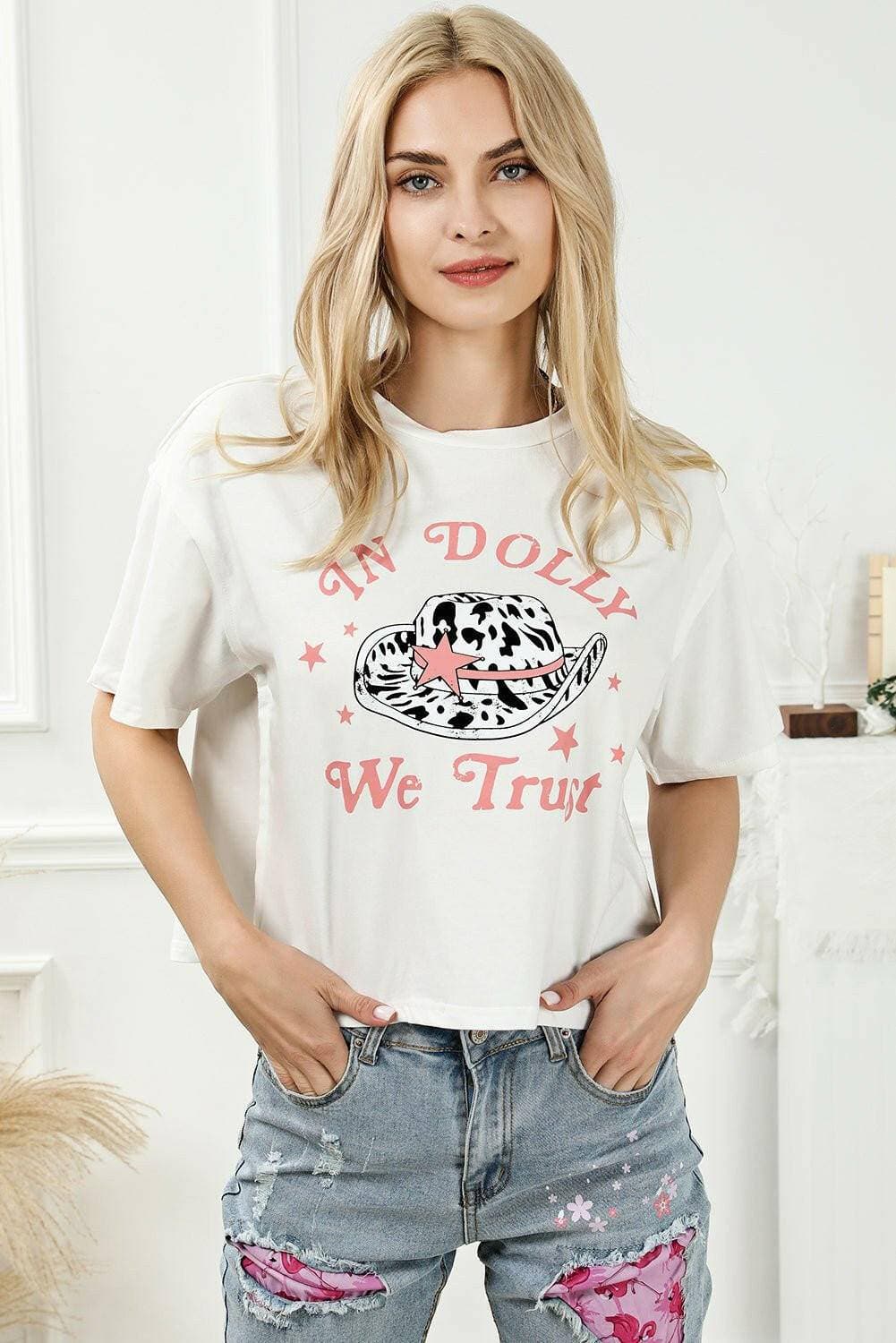 TRUST IN DOLLY Basic Round Neck TeeTRUST IN DOLLY Basic Round Neck Tee
 Upgrade Your Style with TRUST IN DOLLY Basic Round Neck Tee
 
 Main Features:
 
 
Classic Elegance: Elevate your wardrobe with tLove Salve DOLLY Basic Round Neck TeeGraphic