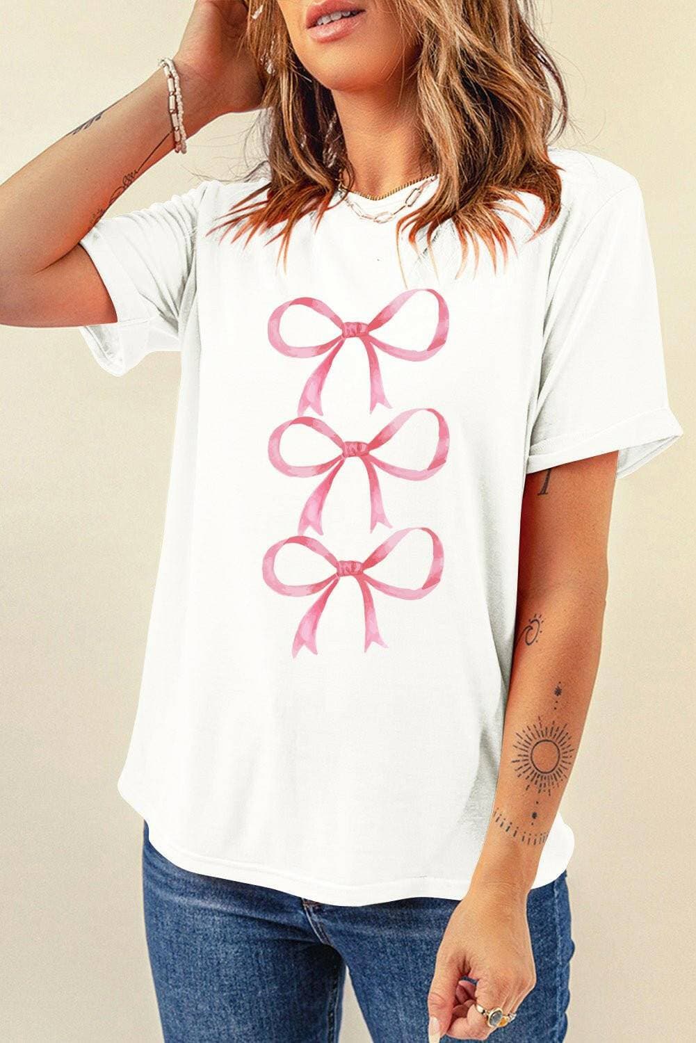 Chic Bow Print Sheer Short Sleeve TeeChic Bow Print Sheer Short Sleeve Tee
 Revamp your wardrobe effortlessly with our Chic Bow Print Sheer Short Sleeve Tee. Elevate your everyday style with this versatLove Salve Chic Bow Print Sheer Short Sleeve TeeGraphic