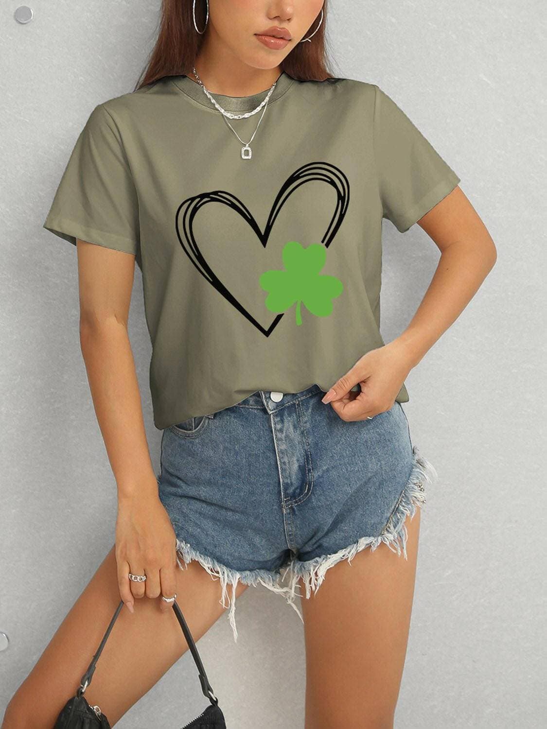 Lucky Clover Heart Stretchy TeeUpgrade Your Casual Style with the Lucky Clover Heart Stretchy Tee
 Experience the perfect blend of comfort and style with our Lucky Clover Heart Stretchy Tee. This Love Salve Lucky Clover Heart Stretchy TeeGraphic