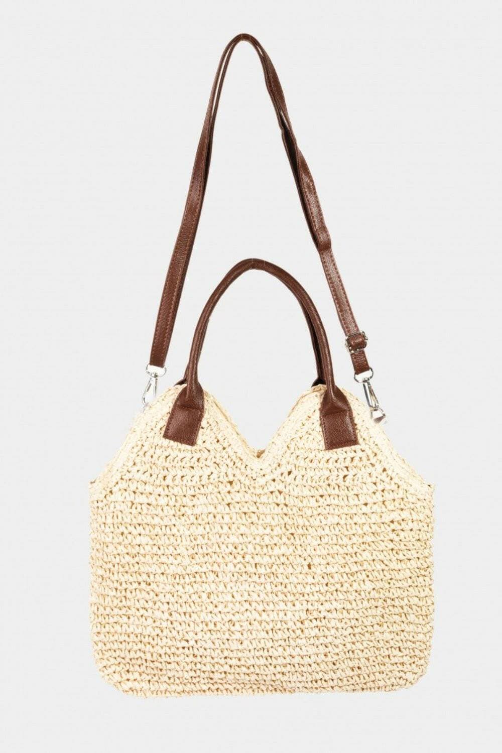 Boho Chic Straw and Faux Leather Shoulder ToteIntroducing the Boho Chic Straw and Faux Leather Shoulder Tote
 Elevate your accessory game with the Boho Chic Straw and Faux Leather Shoulder Tote. This stunning toLove Salve Faux Leather Shoulder Tote