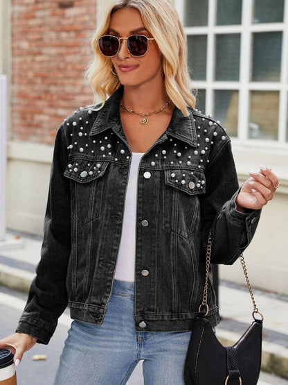 Pearl embellished denim jacket with pockets and pearl detailing for a chic and practical look.