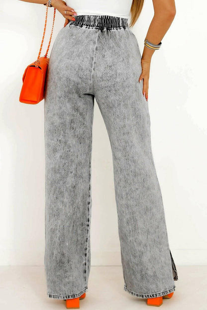 Chic drawstring jeans with stylish slit accents and pockets