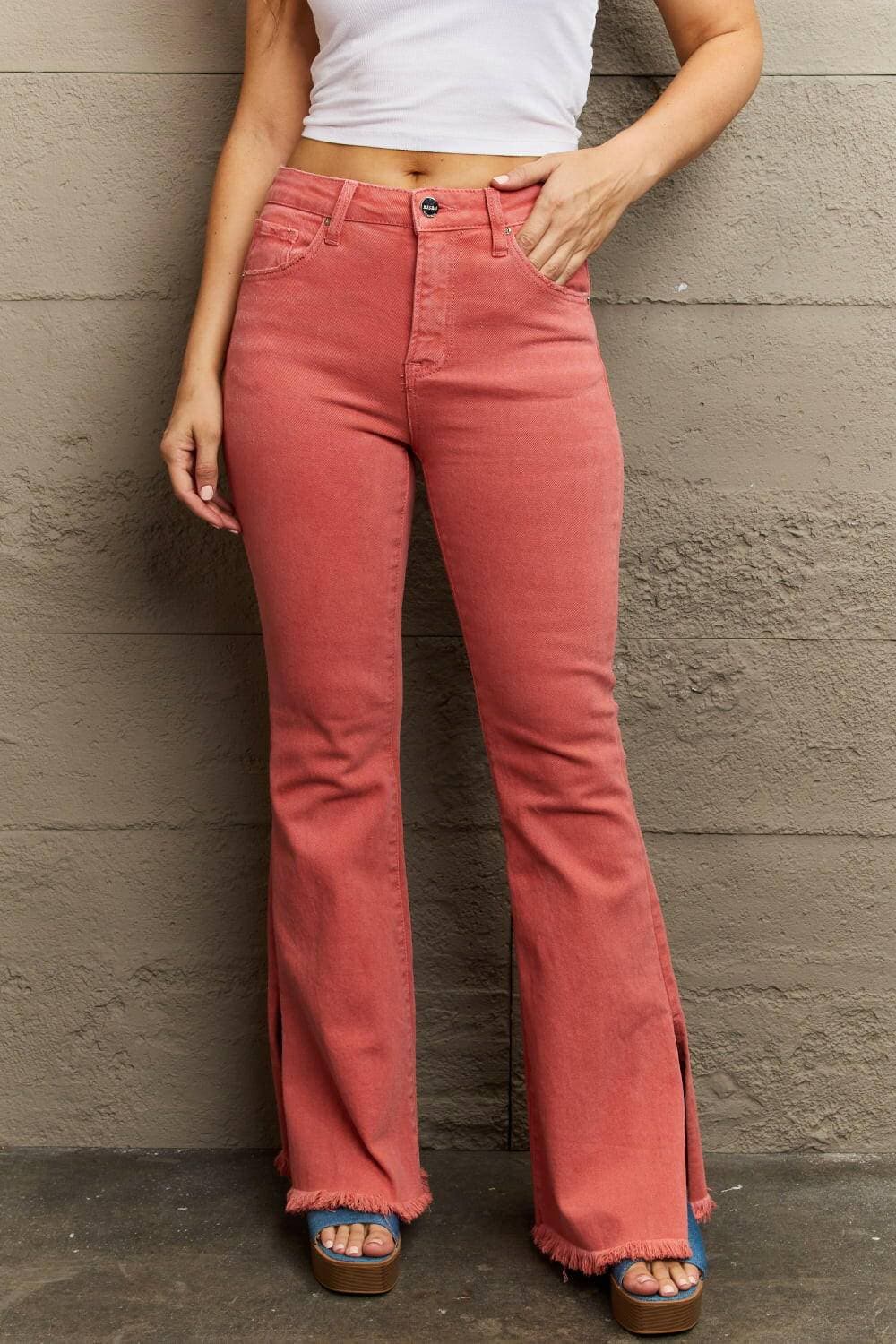 Chic high-rise denim flares with trendy side slits