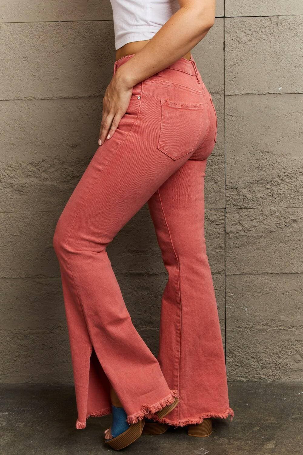 Chic high-rise denim flares with trendy side slits