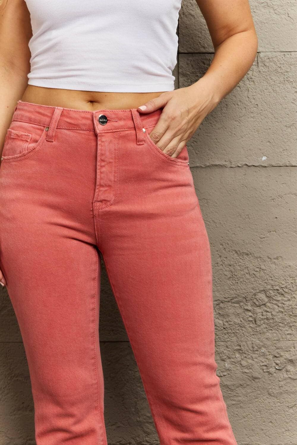 Chic high-rise denim flares with trendy side slits