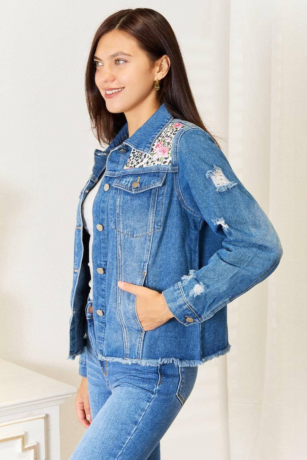 Leopard floral fusion distressed denim jacket with frayed edges