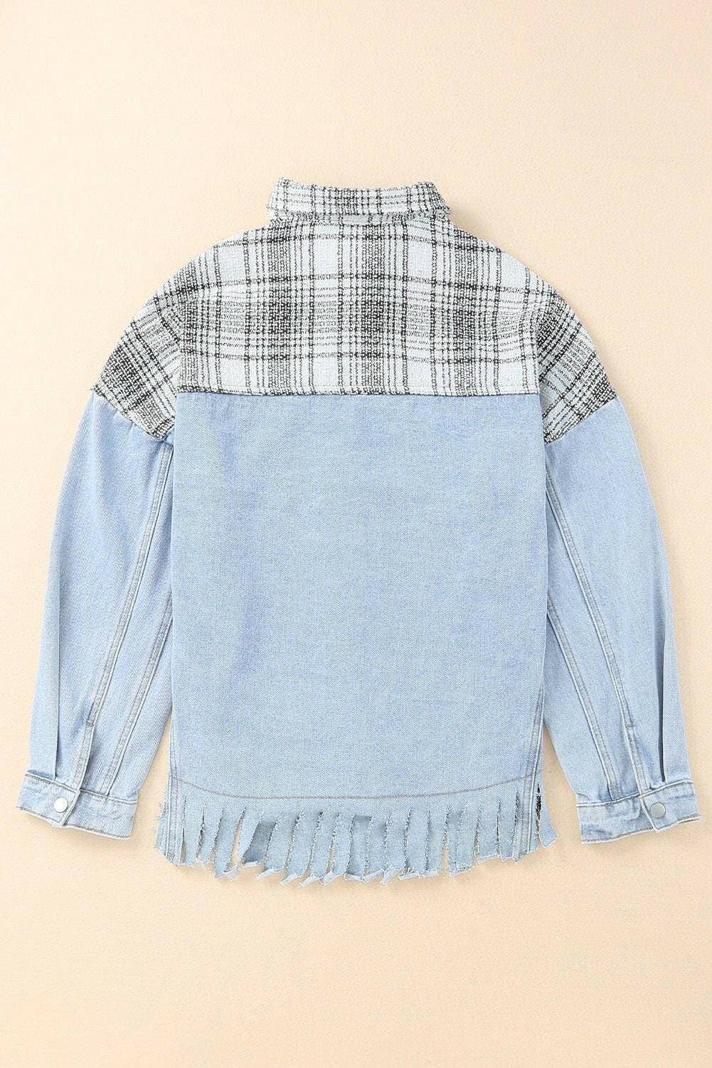 Plaid denim jacket with snap closure and fringe detailing