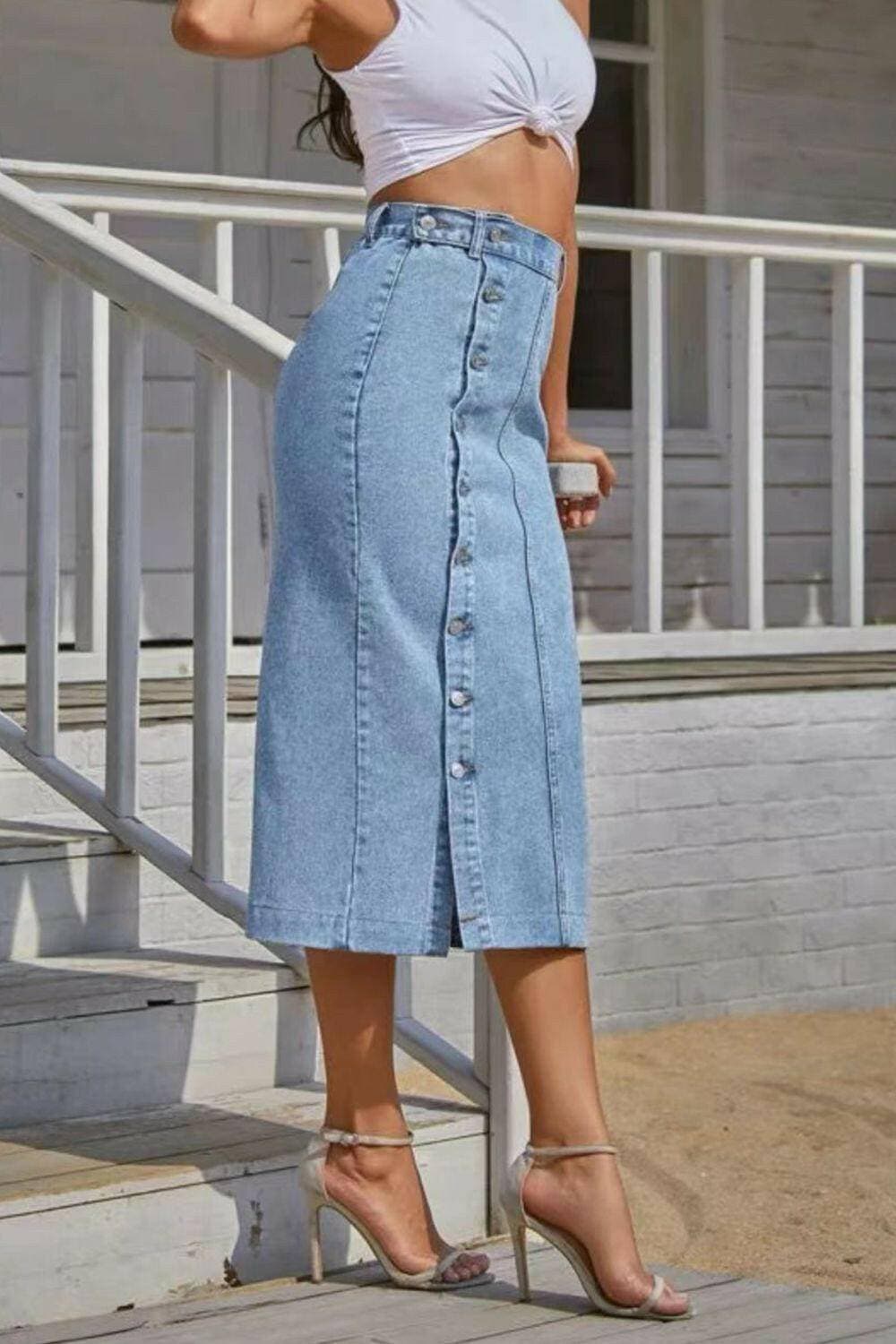 Chic denim midi skirt with daring front slit and stylish button accents