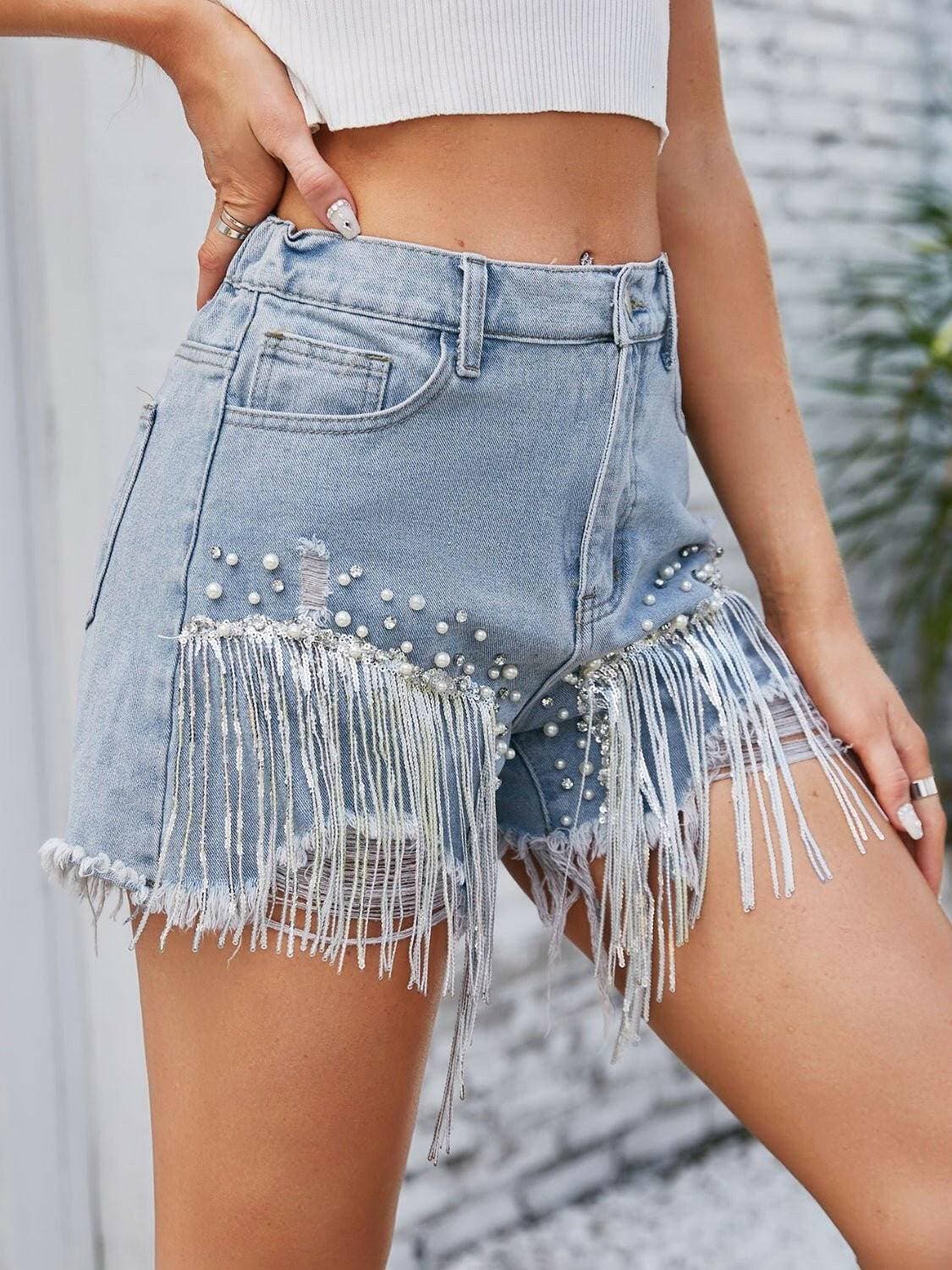 Pearl Adorned Distressed Denim Shorts with Handy PocketsBold Fashion Statement
Make a bold fashion statement with our Pearl Adorned Distressed Denim Shorts, a perfect blend of edgy and elegant style. These meticulously crLove Salve Pearl Adorned Distressed Denim Shortsjeans