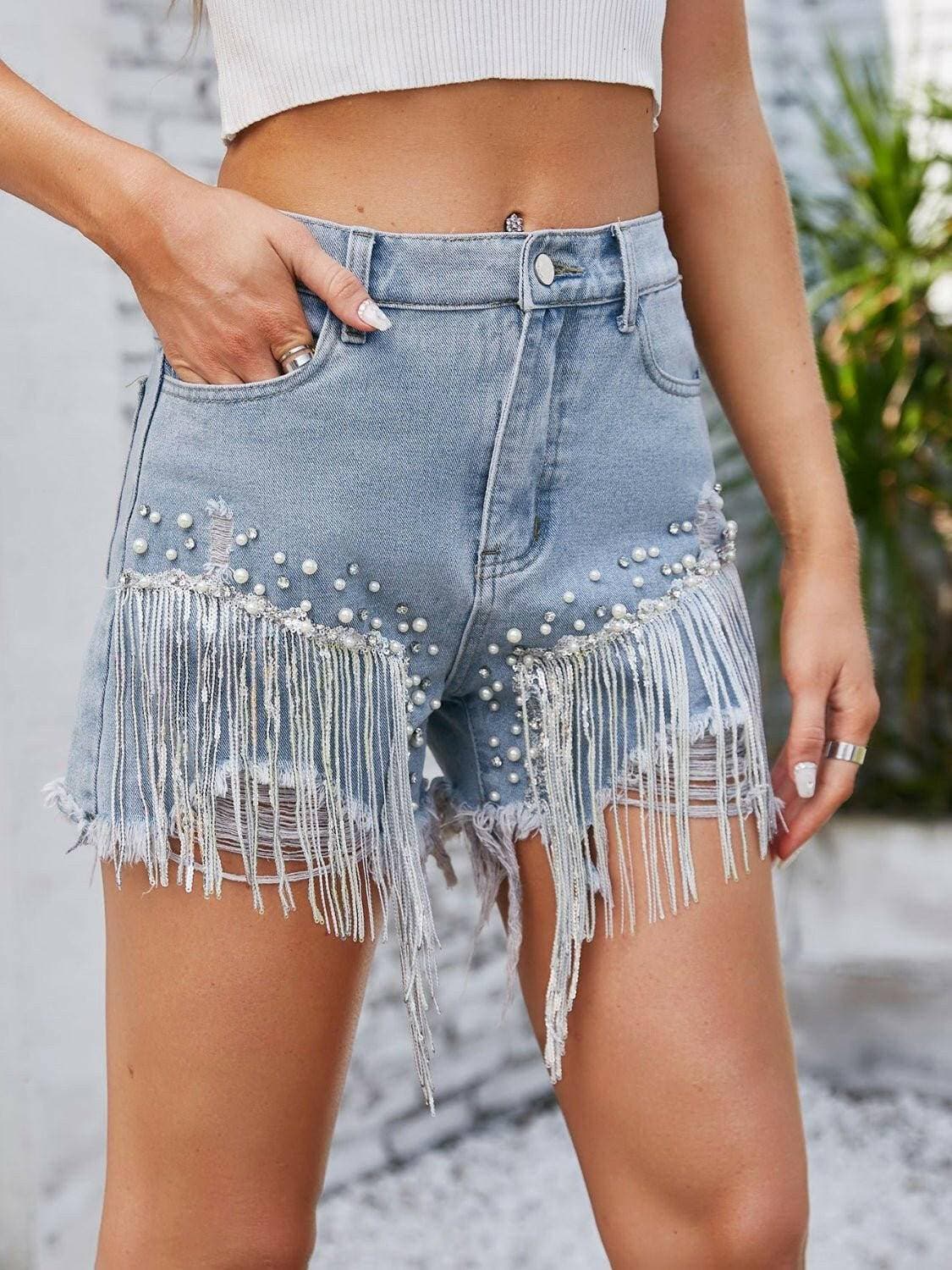 Pearl Adorned Distressed Denim Shorts with Handy PocketsBold Fashion Statement
Make a bold fashion statement with our Pearl Adorned Distressed Denim Shorts, a perfect blend of edgy and elegant style. These meticulously crLove Salve Pearl Adorned Distressed Denim Shortsjeans