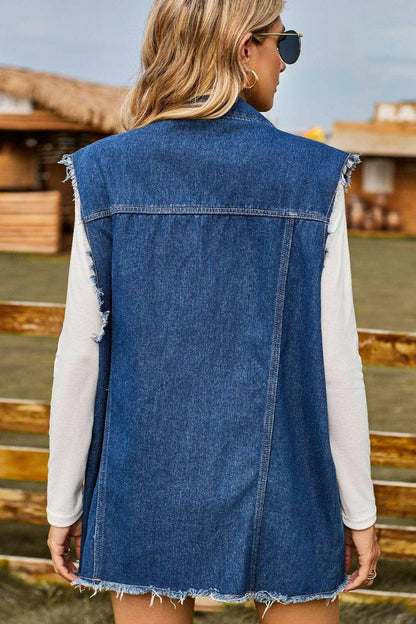 Stylish distressed denim sleeveless top with cowgirl vibes