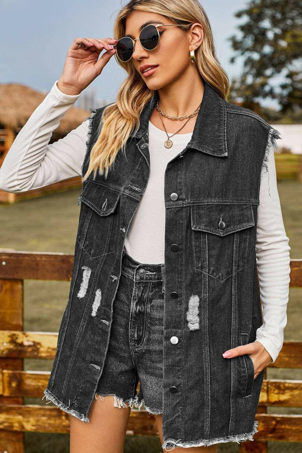 Stylish distressed denim sleeveless top with cowgirl vibes