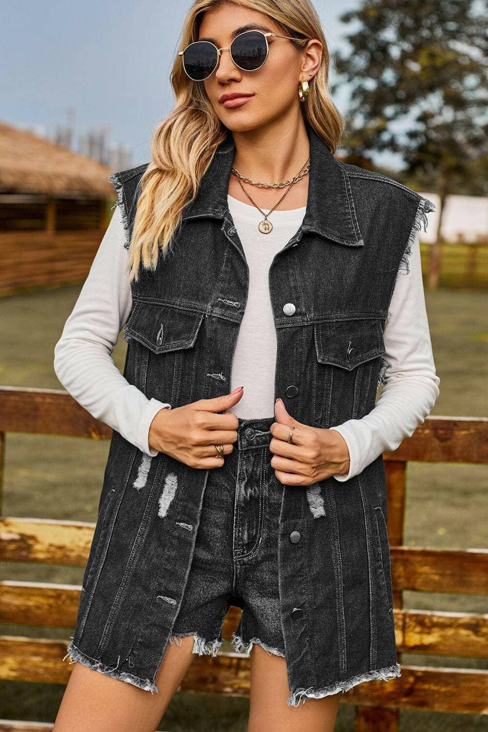 Stylish distressed denim sleeveless top with cowgirl vibes