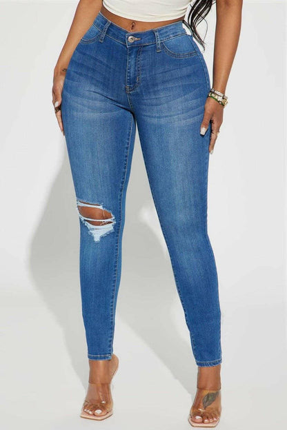 Distressed Denim Jeans with Button Detailing and PocketsUpgrade Your Style with Distressed Denim Jeans

Elevate your fashion game with our Distressed Denim Jeans, designed to turn heads with their unique button detailing Love Salve Distressed Denim Jeansjeans