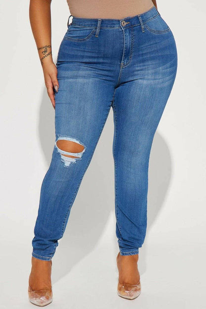 Distressed Denim Jeans with Button Detailing and PocketsUpgrade Your Style with Distressed Denim Jeans

Elevate your fashion game with our Distressed Denim Jeans, designed to turn heads with their unique button detailing Love Salve Distressed Denim Jeansjeans