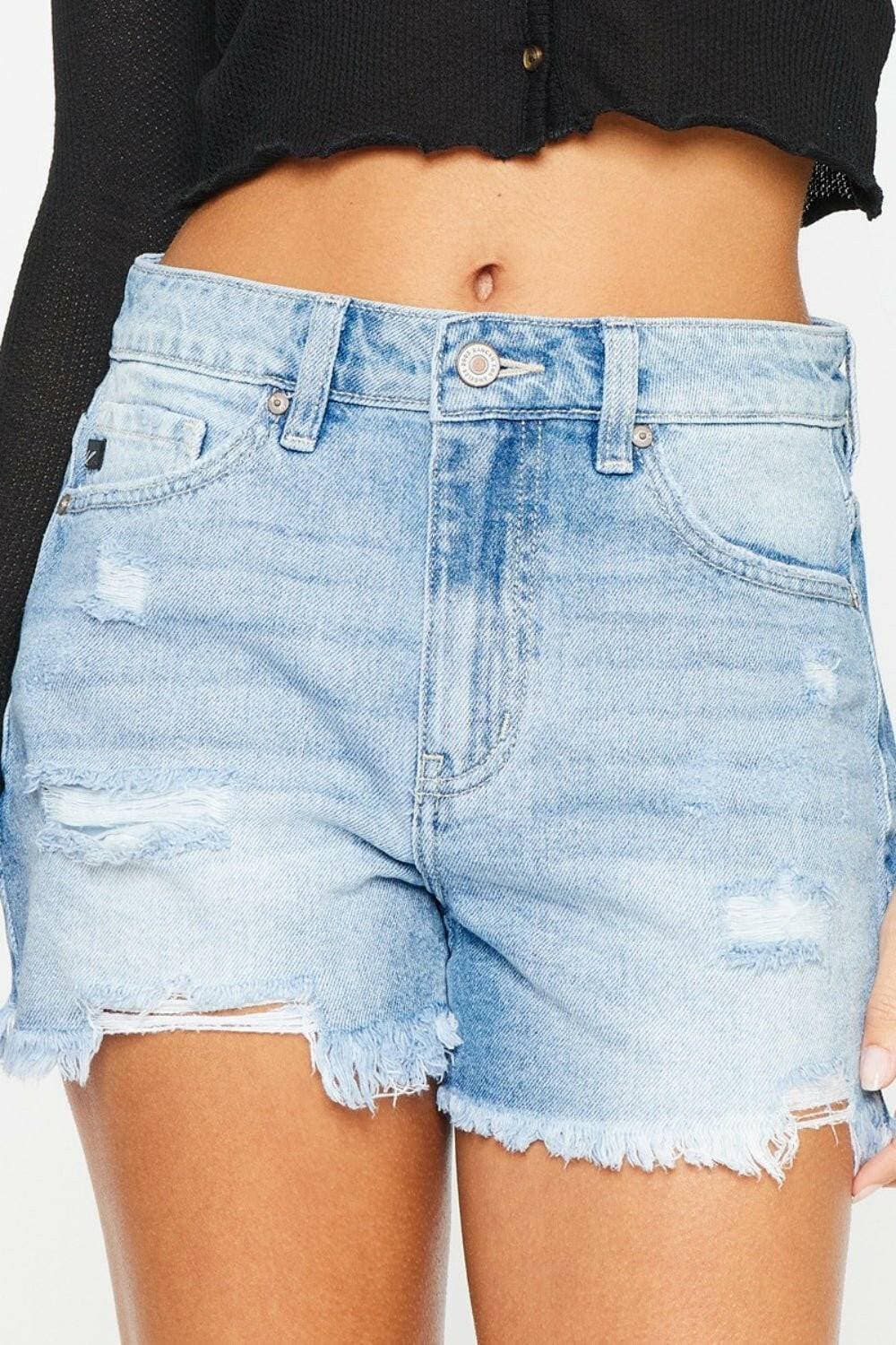 Chic high-waisted frayed denim shorts for the stylish summer look