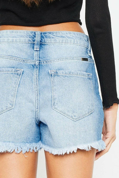 Chic high-waisted frayed denim shorts for the stylish summer look