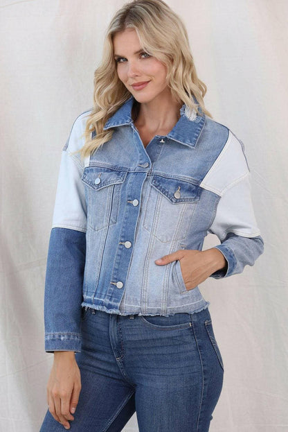 Unique distressed color block denim jacket, stylish fashion look.