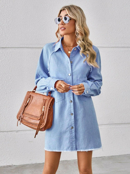 Chic raw edge denim shirt dress with pockets and button-up detailing.