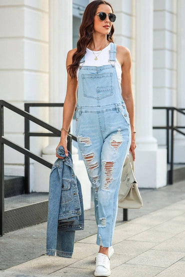 Chic distressed denim overalls with functional pockets