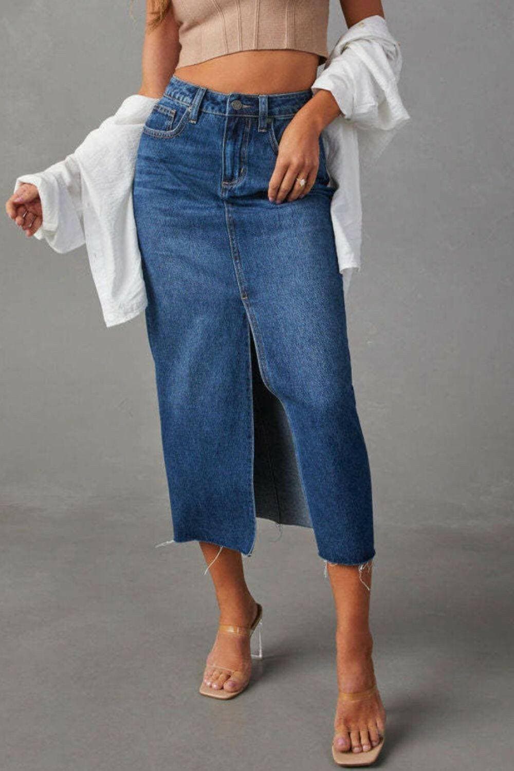 Stylish distressed denim skirt with trendy slit detail