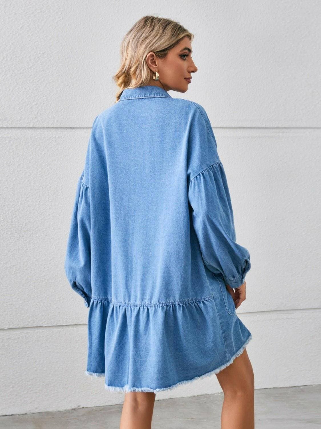 Chic denim shirt dress with functional pockets and trendy distressed hem