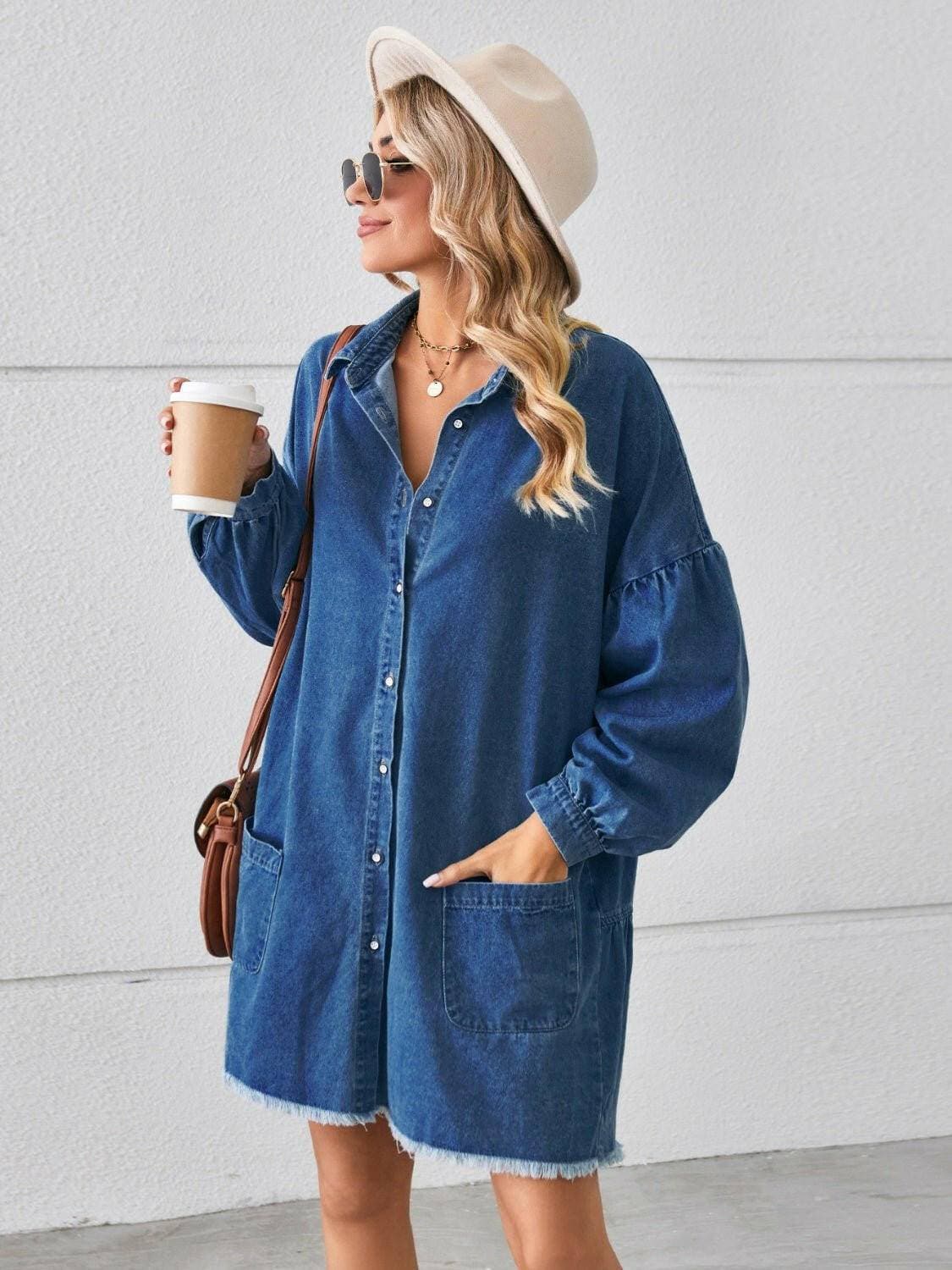 Chic denim shirt dress with functional pockets and trendy distressed hem