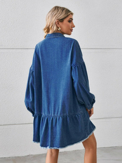 Chic denim shirt dress with functional pockets and trendy distressed hem