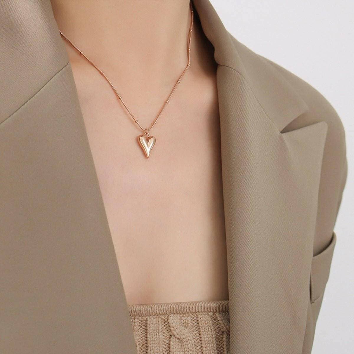 Elegant Heart Pendant Necklace in Titanium Steel with Gold PlatingUpgrade Your Style with Our Elegant Heart Pendant Necklace
 Indulge in sophistication with our exquisite heart pendant necklace crafted from ultra-durable titanium sLove Salve Elegant Heart Pendant NecklaceJewelry